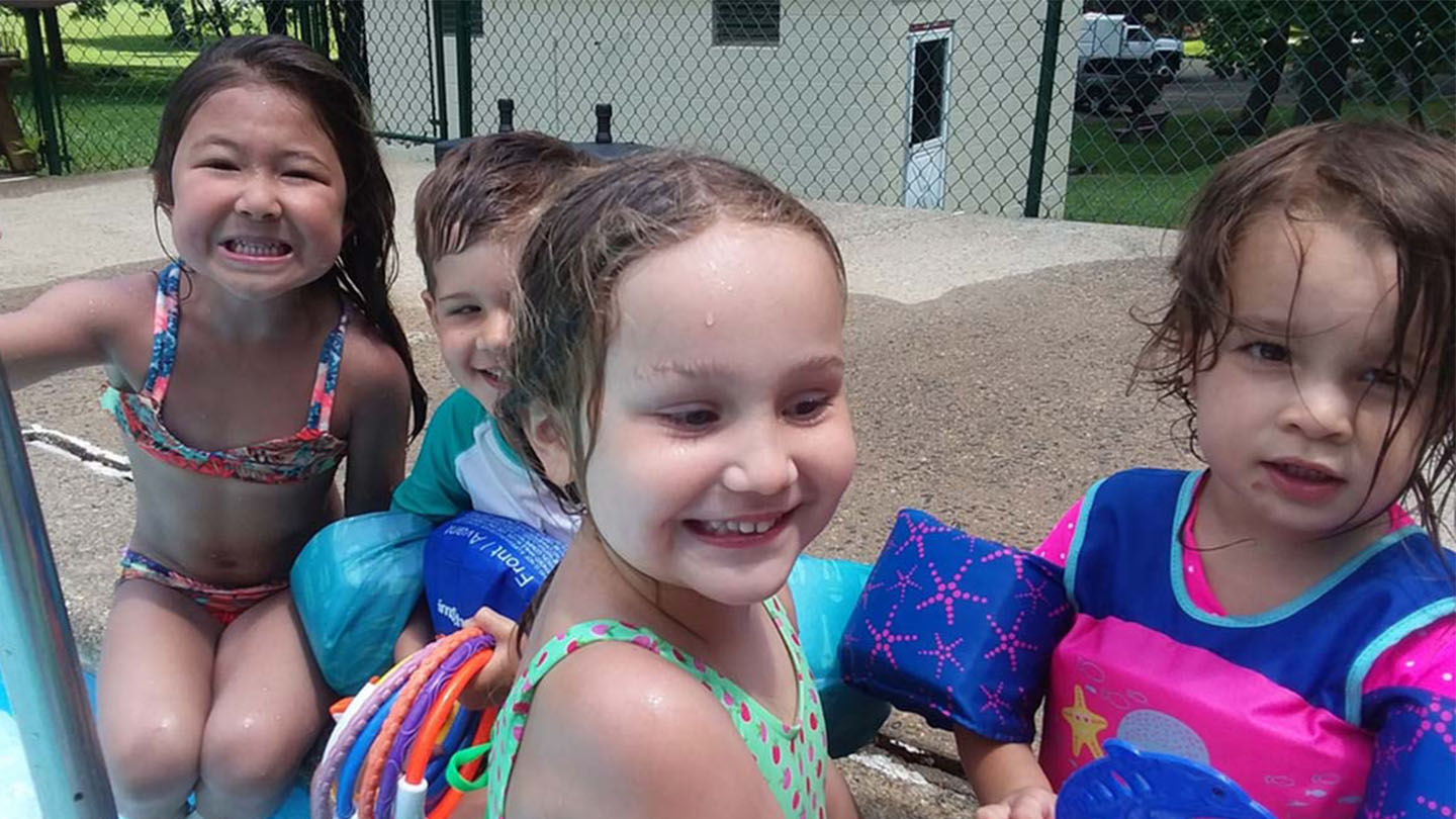 Young campers at poolside