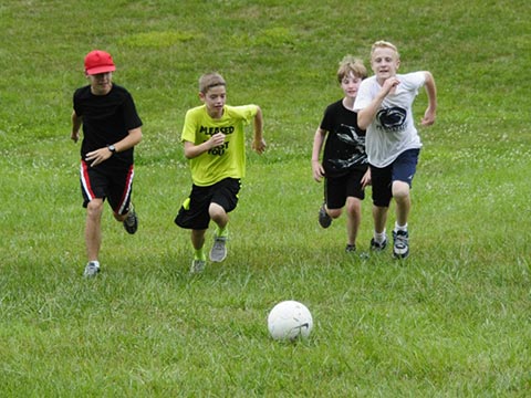 Campers playing soccer